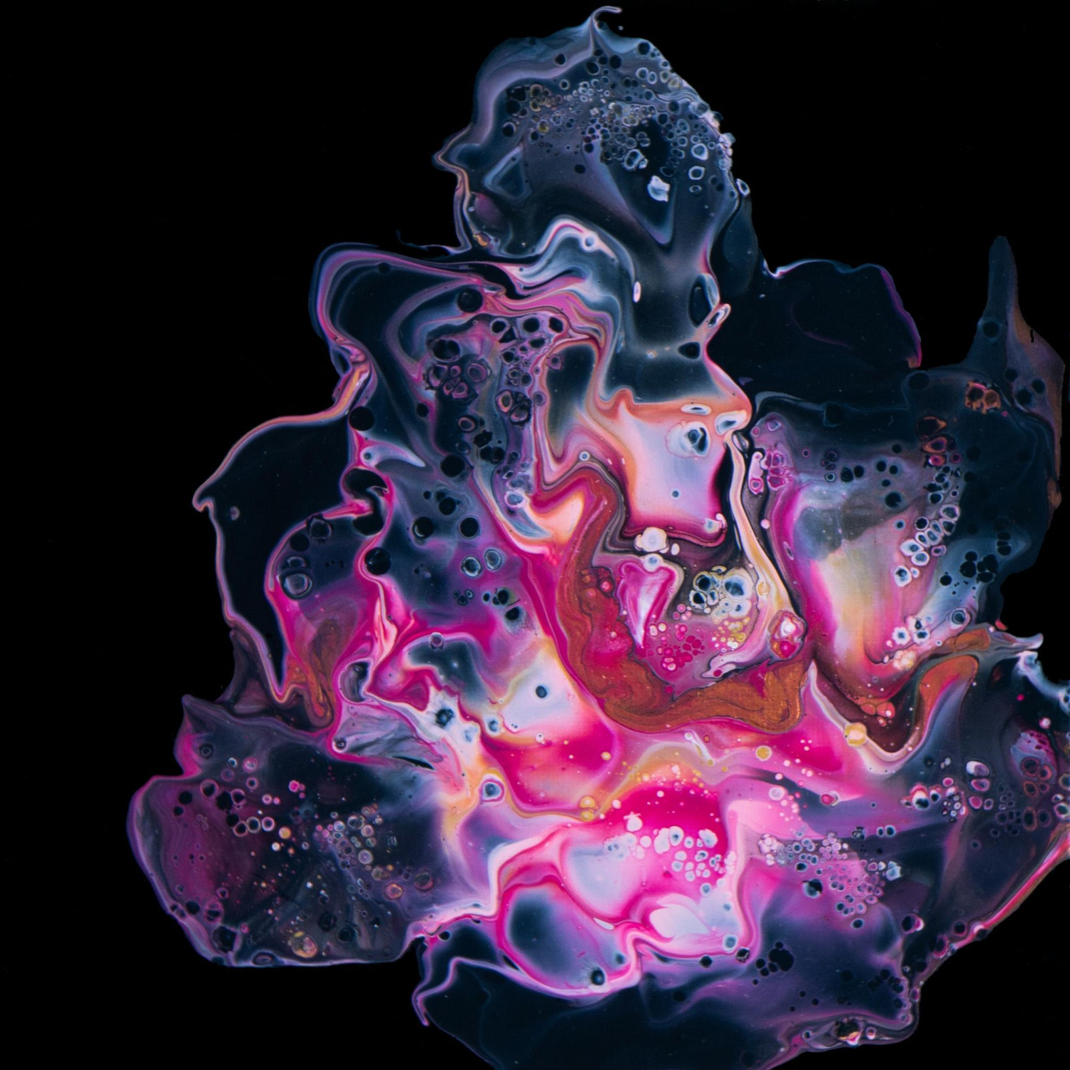 Acrylic pouring painting on black background in shape of lower in shades of pink and coper colors